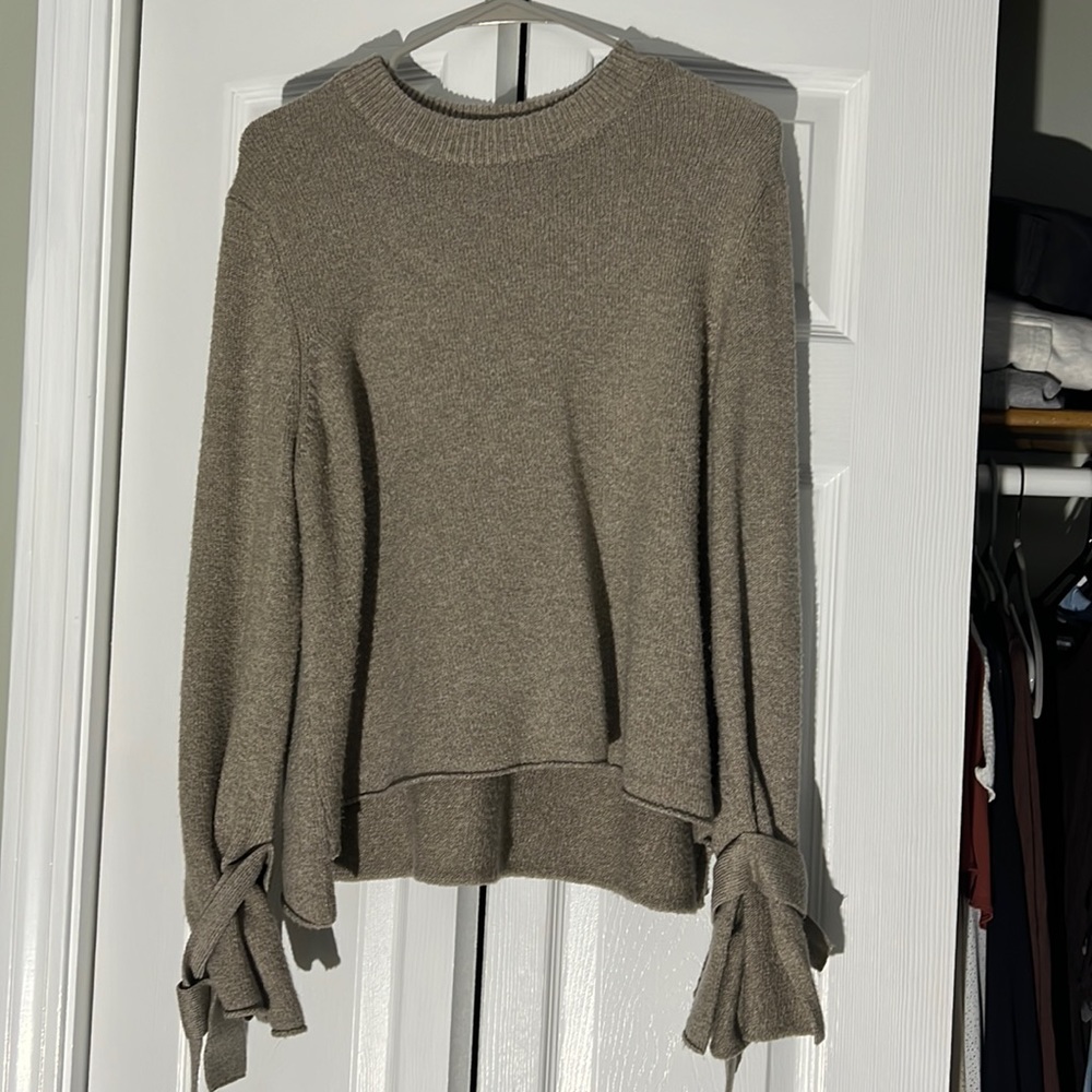 Brown sweater with sleeve ties. Really soft! Barely worn - like new.